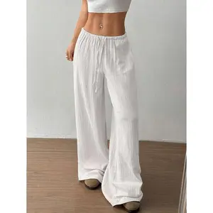 Women’s super low-rise casual straight-leg pants made from organic cotton, baggy fit, drawstring, white, with pockets
