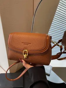 Fashionable retro classic versatile postman bag, a refined and practical handbag with shield embossed decoration, capable of holding a phone and keys, suitable for daily commuting, shopping, and gatherings, Embellished Shoulder Bag