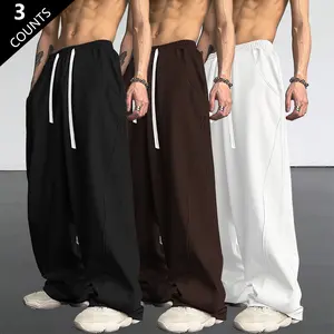 3-pack heavyweight men’s casual pants, solid-color long pants with pockets, elastic waistband with adjustable drawstring, combining comfort and stylish look, suitable for streetwear and outdoor activities.