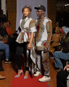 Matching Dashiki-Inspired Couple’s Outfit – Elegant Peplum Top for Her, Classic Tunic and Pants for Him
