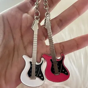 2 Guitar Keychains - Pink and White
