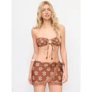 Cider Halter Neckline Aztec O-Ring Tassel Low Rise Cheeky Bikini Set With Sarong SwimWeek