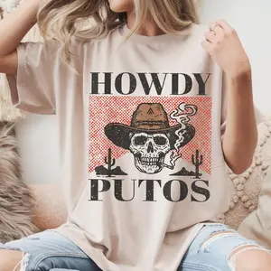 Howdy Putos Funny Western Cowboy Skull Retro Vintage T-Shirt, Howdy Putos Vintage T-Shirt, Western Cowboy Skull Tee, Funny Retro Western Shirt, Edgy Country Style Outfit - Womenswear Top
