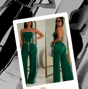 This Moment women's two-piece set features a sexy strapless top paired with flowing, waist-cinching and slimming straight-leg trousers for a stylish look