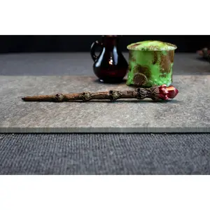 Skullroot Wand - 10 Inch Tree Trunk Wand with Carved Skulls & Jagged Red Crystal Tip for Necromantic Workings and Shadow Work