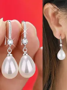 Water droplet pendant oval pearl earrings and earrings are suitable for daily wear, vacation dates, and other occasions, and are also a surprising and exquisite small gift.