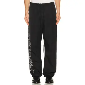 Fear of God ESSENTIALS Active Trace Relaxed Drawstring Pant in Vintage Black