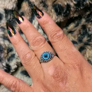 Evil Eye Ring - Blue Eye Design, Silver Color, Adjustable Fit, Unique Fashion Accessory for Women