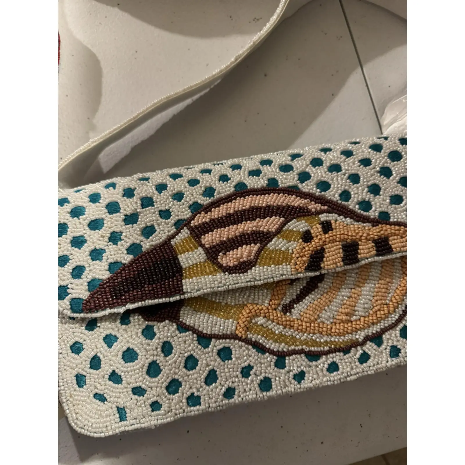 Beaded Clutch with Fish Design, White Base, Teal Polka Dots, and Brown Accents