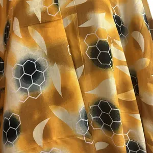 Somali Dress Bati with Honeycomb & Leaf Pattern in Vibrant Mustard Yellow Fabric for Stylish Wear