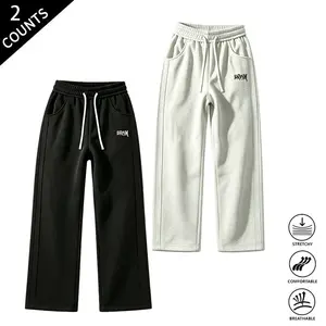 Pack of 2 men’s drawstring pants with printed design—curved hem, casual and comfortable, loose fit, suitable for all seasons. Streetwear men's pants, men's casual everyday pants