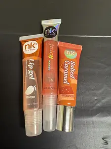3 randon Nk lip gloss