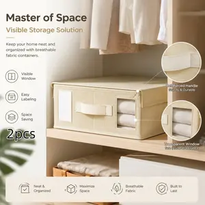 Fabric bedding storage box with lid, transparent window, foldable design, suitable for storing clothes, sheets, and wardrobe items.