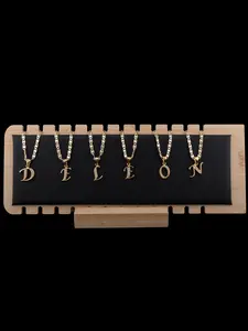 New small initials letters in gold-plated finish, includes an 18-inch or 24-inch chain. ALL LETTERS AVAILABLE.