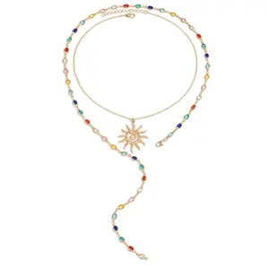 Sun pendant necklace with a light luxury and high-end feel, featuring tassels and eye motifs, long chain, colorful and minimalist style, clavicle chain nut