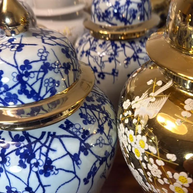 Porcelain Vase with Blue Floral Design and Gold Accents Decorative Container