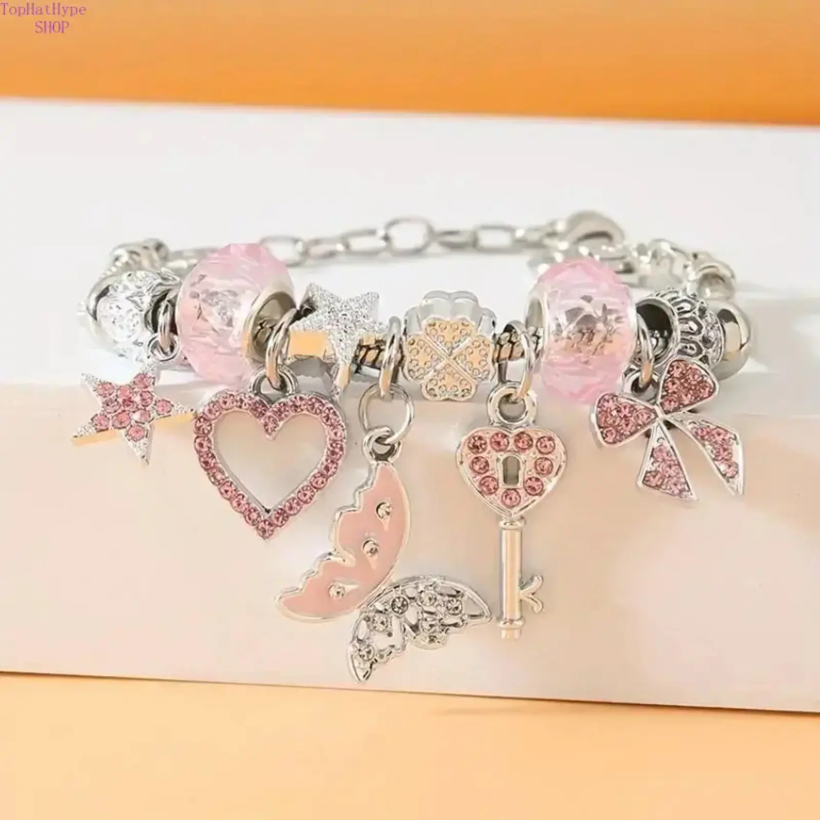Women's Dainty Adjustable Princess-Style Charm Bracelet - Costume Jewelry with Heart-Butterfly-Star Pendant, 5th Birthstone Sparkling Pink Crystal, Exquisite Stackable Daily Accessory, Ideal Birthday Gift