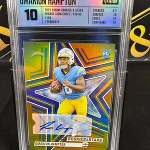2025 Rookies and Stars Omarion Hampton Orange Signatures /199 graded Titan 10