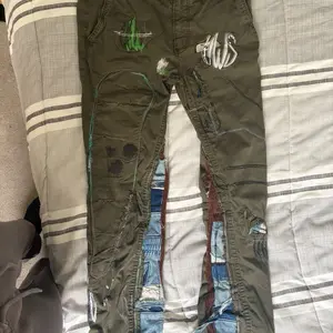 Custom Jeans Sz 31 - Distressed Design with Unique Patterns and Patches