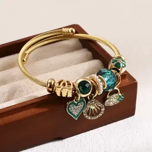 Charm Bracelet - Stack Your Sparkle with Gold-Tone Wire Design and Colorful Charms Including Heart and Bee Motifs