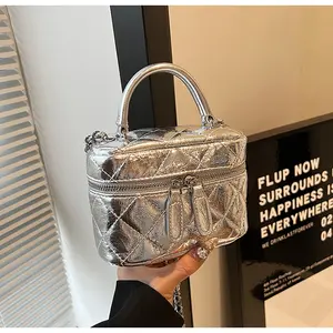 Chic diamond quilted round box crossbody bag made of waterproof PU. Adorable heart zipper accent and built-in coin pocket, lightweight and practical for all-day daily use.