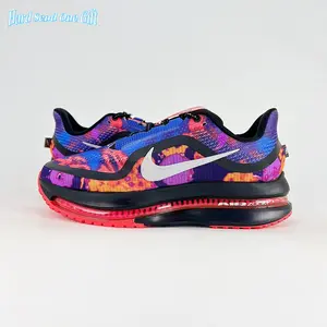 Air cushion running sneakers feature full-length shock absorbing air midsole, crafted from breathable woven knit mesh, vibrant purple-orange abstract tie-dye print with bright red rubber outsole, lightweight build