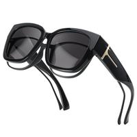 Black Frame Grey Lens