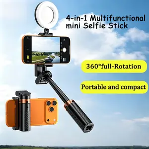 2026New 4-in-1 mini adjustable tripod with 360 rotation. It features wireless Bluetooth shutter control and a clip-on phone holder. Suitable for selfie , video grabar . Compatible with most smartphones , with a maximum extension of 15.7in tiktokshopspring