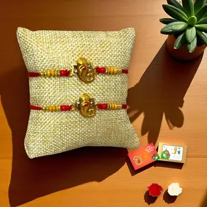 Celebrate Raksha Bandhan with Ganesh Rakhi Hamper | Includes Designer Thread Bracelets, Roli Rice, Greeting Card, Gift Envelope | Cherished Protection