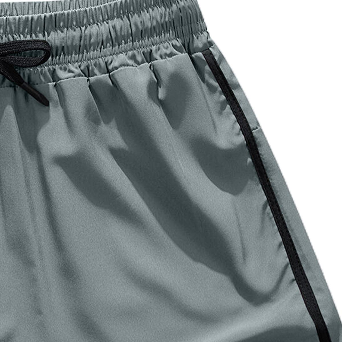 Men’s quick-dry, stretchy summer training shorts with built-in liner—lightweight, breathable running shorts that are versatile for gym workouts and beach trips; a stylish 2‑in‑1 quick‑dry, breathable athletic short for training.