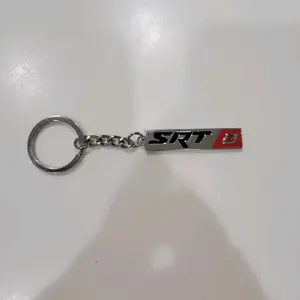 SRT Keychain - Metal Keychain with Red and Black Design, Featuring "SRT" and "8" Text