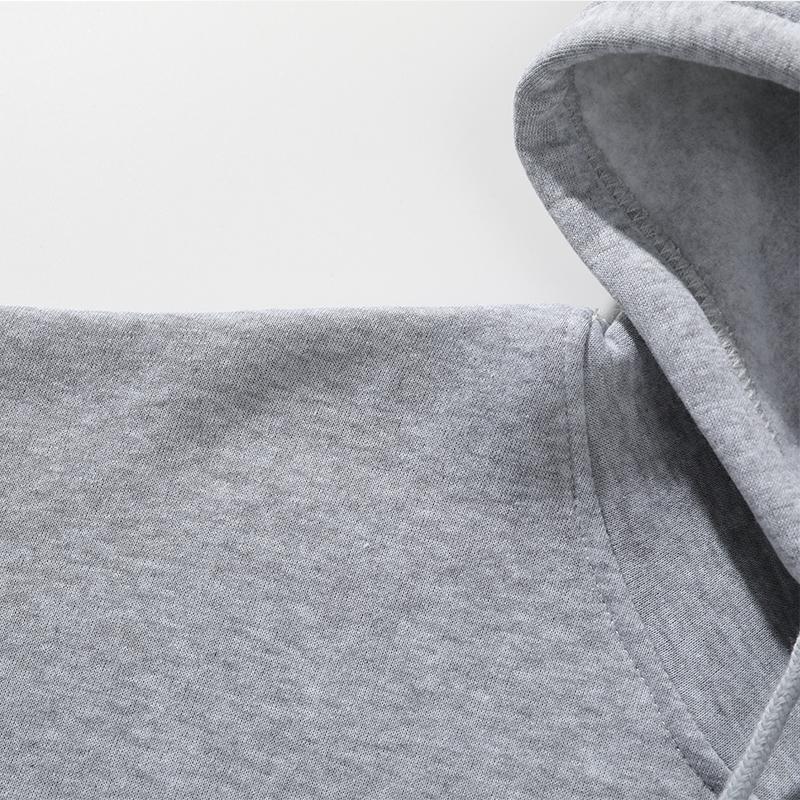 Women’s solid-color hooded sweatshirt  featuring a loose-fit long-sleeve pullover hoodie and straight wide-leg sweatpants; a casual, warm two-piece outfit for everyday wear. matching sets women fall