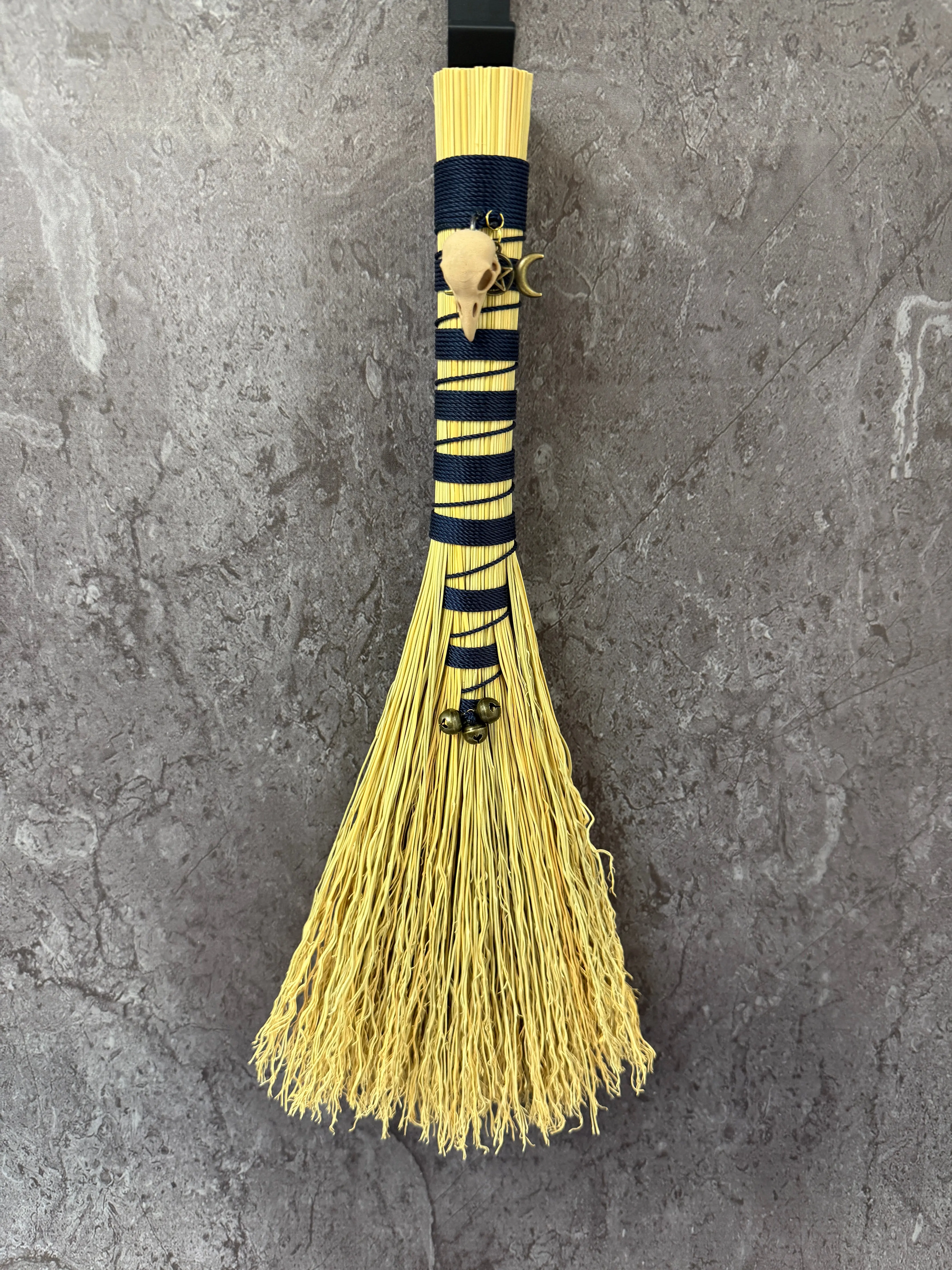 Hawks tail besom broom - Navy ravens head.