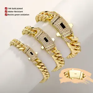 14K Gold Plated Cuban Bracelet. Stunning new gold-plated craft and classic white stone inlay design. Miami Cuban chain merges tradition and hip-hop fashion. The ultimate gift for him/her. 6mm-14mm, 7.5/8.5 inches in stock Resists Green Oxidation Iced Out