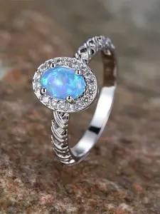 An oval-shaped, braided hemp rope ring with synthetic white crystal accents, exuding a stylish and elegant look, perfect for everyday wear as part of a wedding ensemble for women, Unique Rings