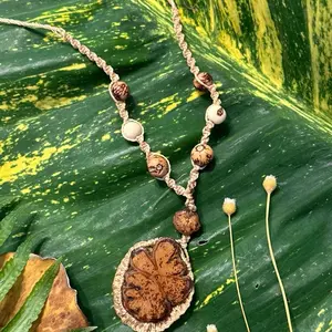 Ayahuasca Necklace Handmade Shamanic Jewelry Ethically Harvested Vine Visionary Art Pendant Adjustable Macrame Thread Organic Beads Spiritual Wear Handcrafted in Peruvian Amazon Natural Ayahuasca Vine Cross Section Pendant