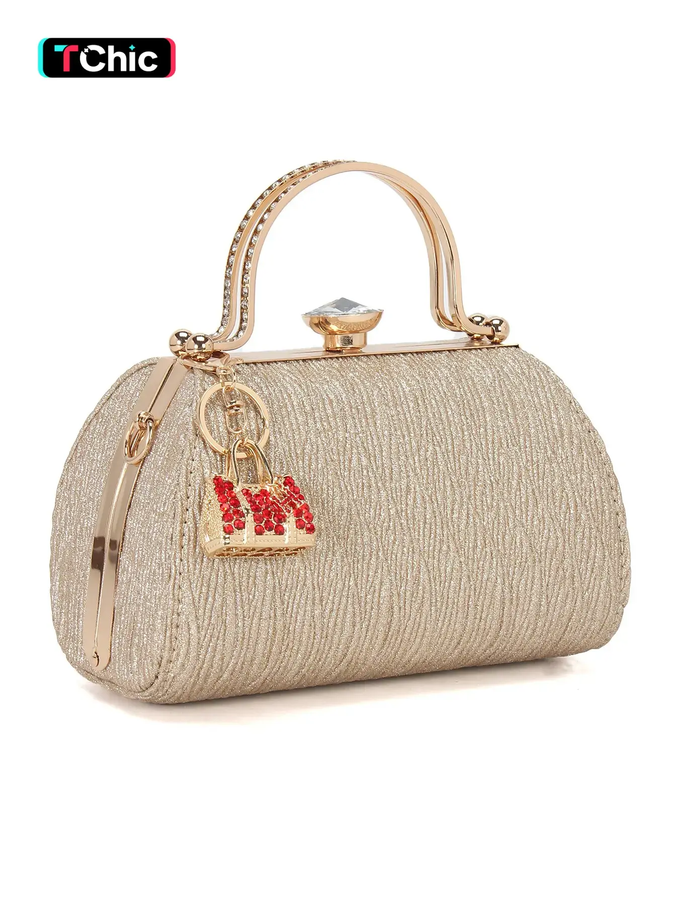 Shimmering gold elegant clutch, with rhinestone handles and a mini bag charm, designed for weddings, parties, and dances, a fashion accessory that can be worn as a crossbody bag with the included shoulder strap, ladies' evening bag