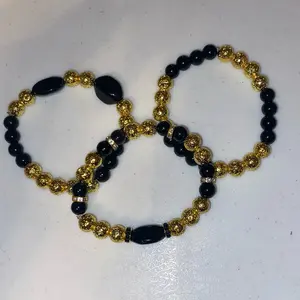 Gold and black bracelet set