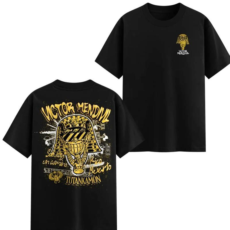 Rico o Muerto Victor Mendivil Graphic T-Shirt – Egyptian Pharaoh Design with Bold Yellow Text, Premium Cotton Fabric, Unisex Fit for Streetwear Enthusiasts, Perfect Gift for Pop Culture Lovers
