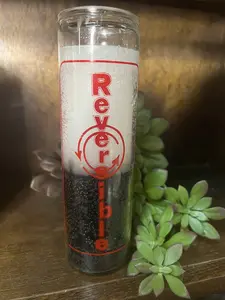 Double Reverse-A double action candle is essentially two spell candles in one - a black candle to reverse and remove negativity and a white part to bring healing and purity.