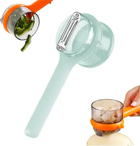 nhanced Kitchen Peeler with Peeling Catcher | Double-Sided Steel Blades | Keeps Peels Contained for a Cleaner Cooking Experience