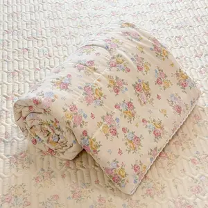 A summer cool blanket with lace pink rose pattern, soft and breathable summer thin blanket, suitable for summer bedroom, office, bed, living room, and home leisure use as an air conditioning blanket