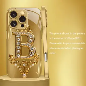 This phone case features a gold "B" design, electroplated glass construction, and is drop-proof, fingerprint-resistant, and skin-friendly. It's compatible with iPhone 17, 16, 15, 14, 13, 12, 11, and Samsung models. It makes a great gift for friends