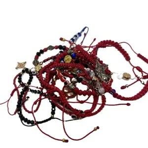 Evil eye and saint bracelets: Pulseras de mal de ojo y santo