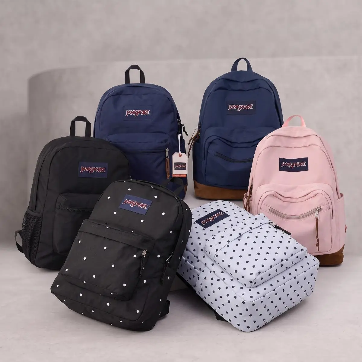 JanSport Classic Backpack, Large-Capacity Lightweight Rucksack for Teenagers and Students, Available in Solid and Polka Dot Patterns—Laptop Daypack