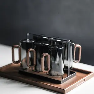 2/4/6 PCS Borosilicate Glass Tea Cup Set with wooden handle, refined glass cups for kitchen essentials and glass drinkware intent, used for daily tea brewing, home hosting, and cozy living room tea serving scenes