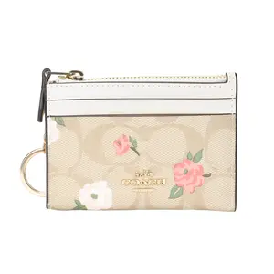 COACH Skinny ID Case with Floral Print Logo on Canvas for Women in Gold and Light Khaki Chalk Multi-Color