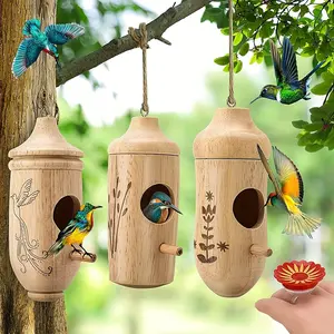 Perfect for garden and window decoration, includes a bird feeder, making it an ideal gift for bird lovers. 3-piece outdoor wooden hummingbird house set