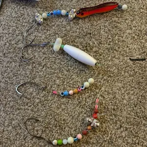 Sturgeon Snatcher                                                           leader with beads and rattles and weight slide set up for fishing bottom just tie and go!