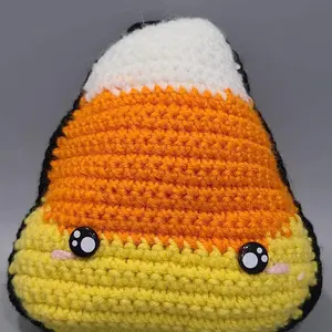 Crocheted candy corn plushie